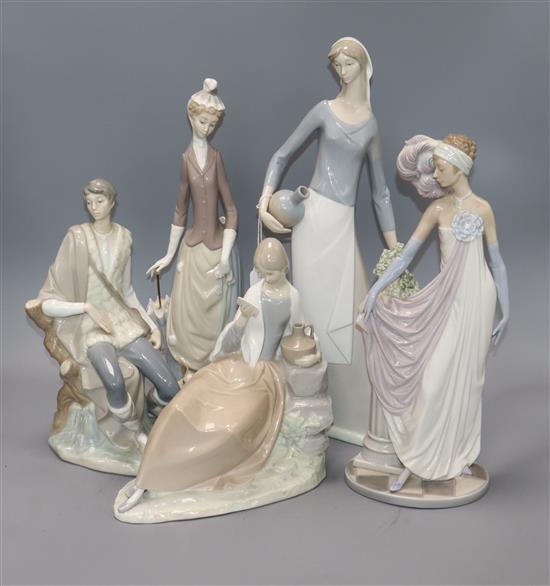 Three Lladro figures and two Nao figures